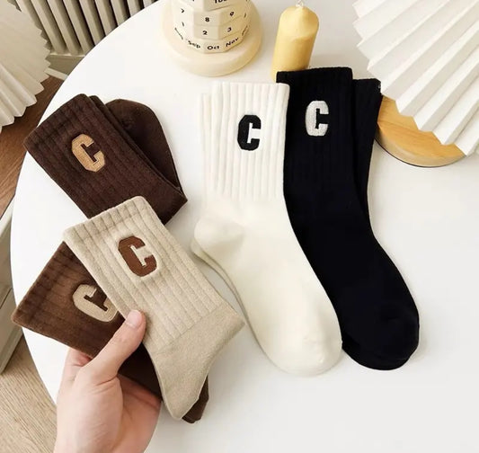 '©' letter crew socks
